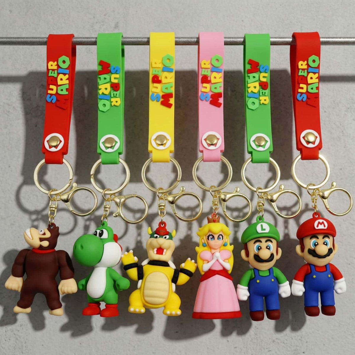 HYOIIO keychain in hand for scale and portable convenience