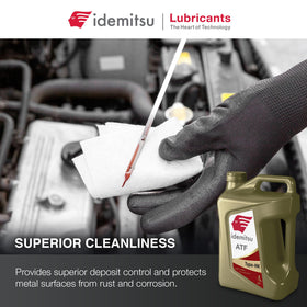 Idemitsu ATF Type HK pouring into funnel during transmission service for smooth shifts