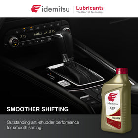 Pouring Idemitsu ATF Type HK4 into transmission funnel illustrating easy, mess-free service