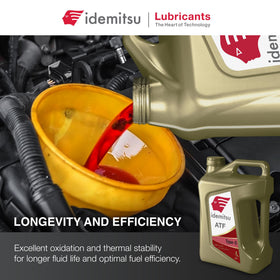 Idemitsu ATF Type S 5 quart next to measuring scale showing correct service volume