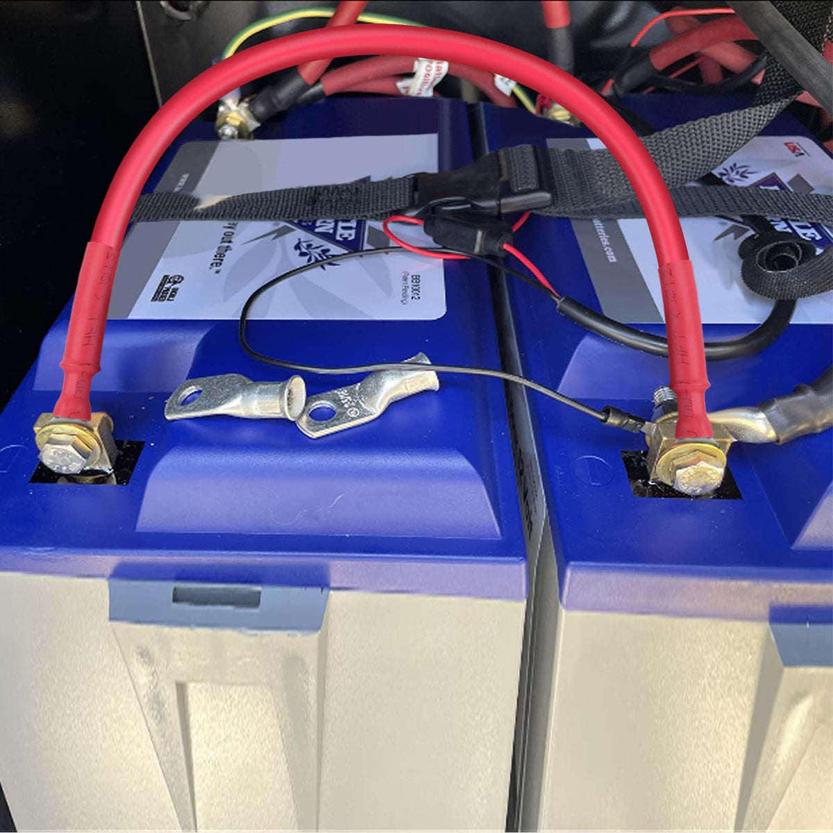 iGreely cables installed on a battery showing tidy, reliable connection