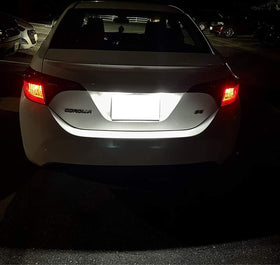iJDMTOY lit license plate at night demonstrating improved plate readability benefit