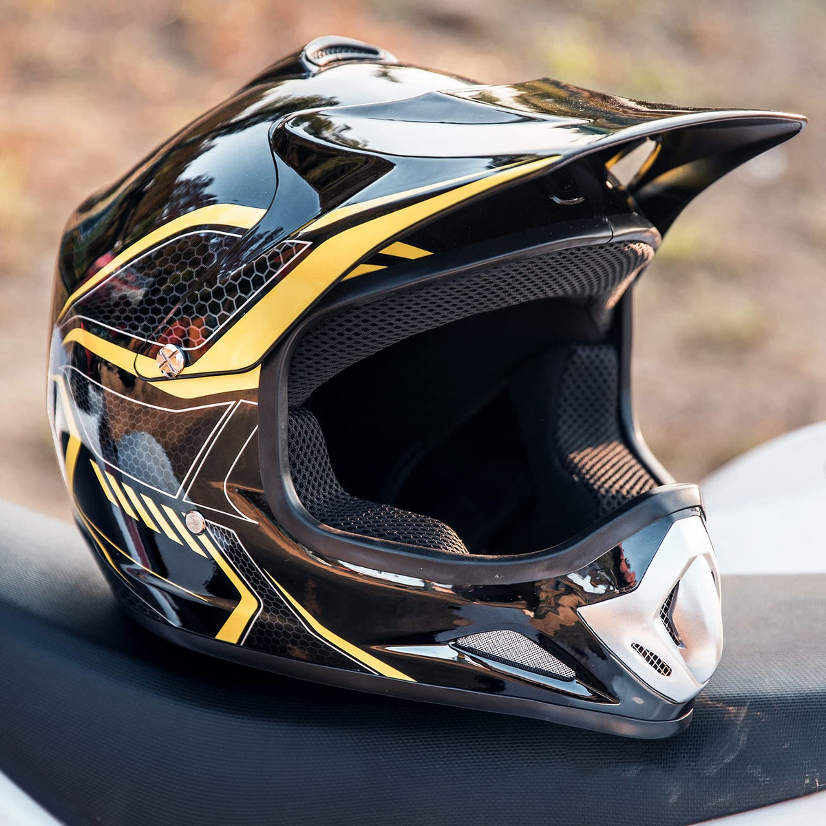 ILM helmet next to ruler showing youth medium sizing benefit