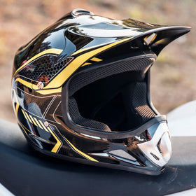ILM helmet next to ruler showing youth medium sizing benefit