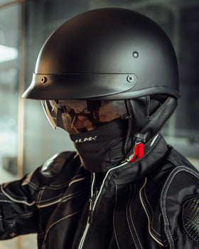ILM helmet worn by rider in urban setting illustrating everyday commuter use