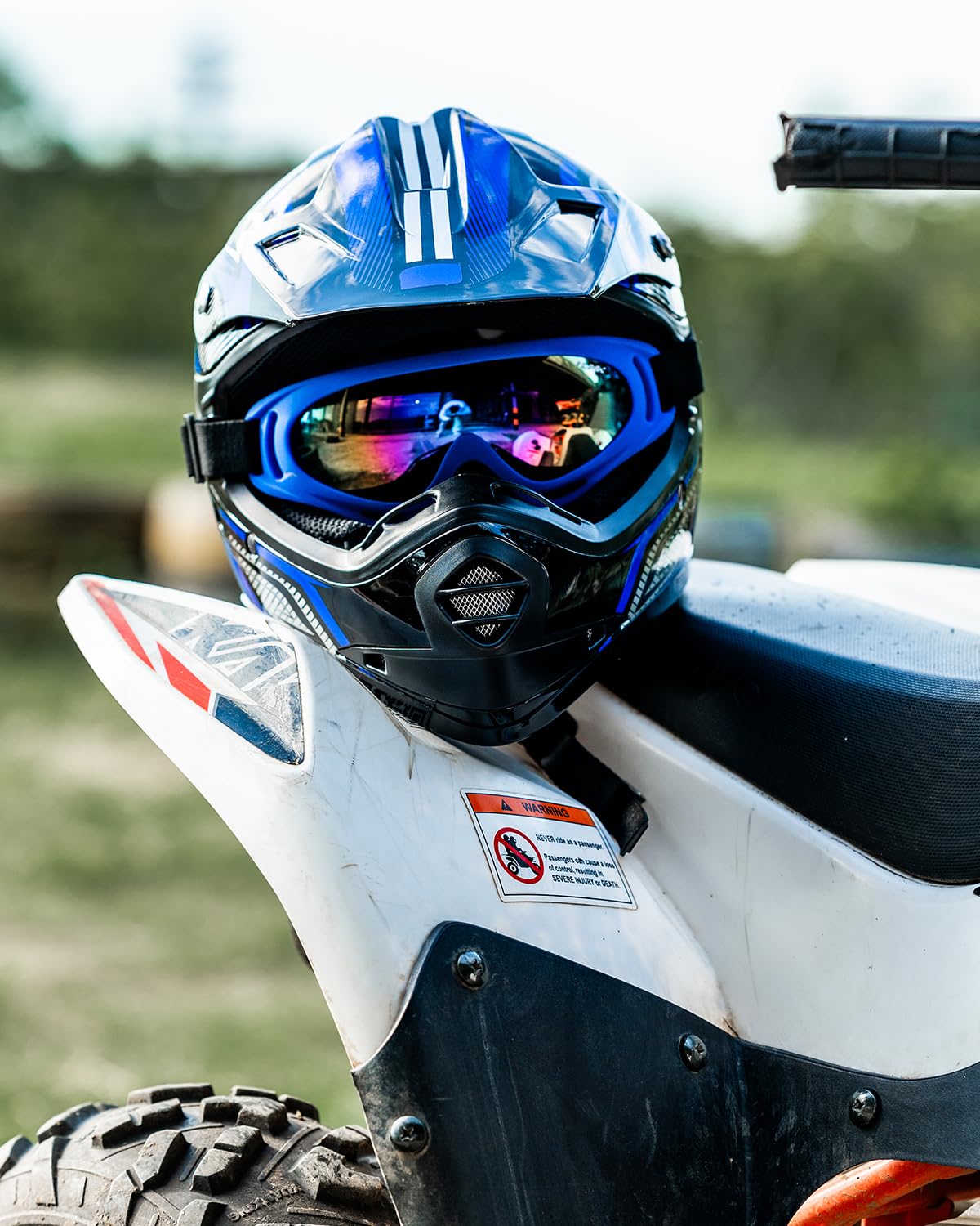 ILM youth rider wearing helmet on trail demonstrating fit
