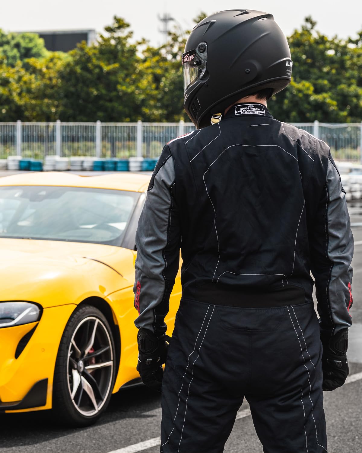 ILM helmet on a racer at the track illustrating race-ready features and fit