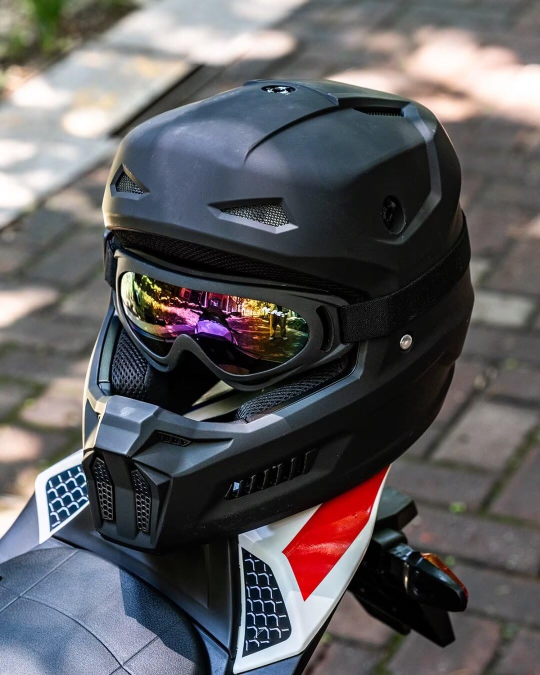 ILM child riding off-road wearing helmet kit showing confident protection