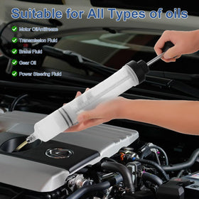 IMSTMTER extractor in use removing engine oil to reduce messy spills