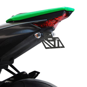 INKUDRI lifestyle riding shot rear profile showcasing sleek, race-inspired look