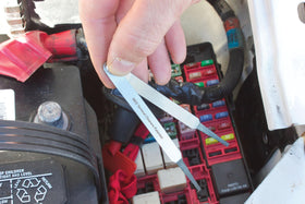 Innovative Products of America packaging and label highlighting patented terminal cleaning design
