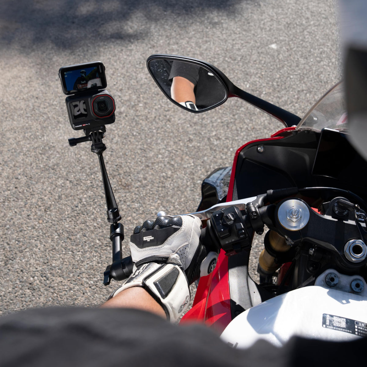 Rider using Insta360 Magic Arm on a road ride capturing dynamic POV footage