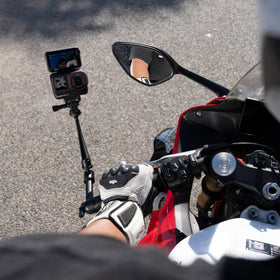 Rider using Insta360 Magic Arm on a road ride capturing dynamic POV footage
