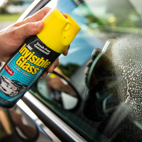 Invisible Glass foam close-up clinging to windshield for easier dirt removal