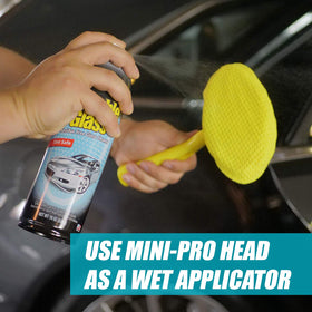 Invisible Glass tool in use cleaning interior windshield for safer, easier reach