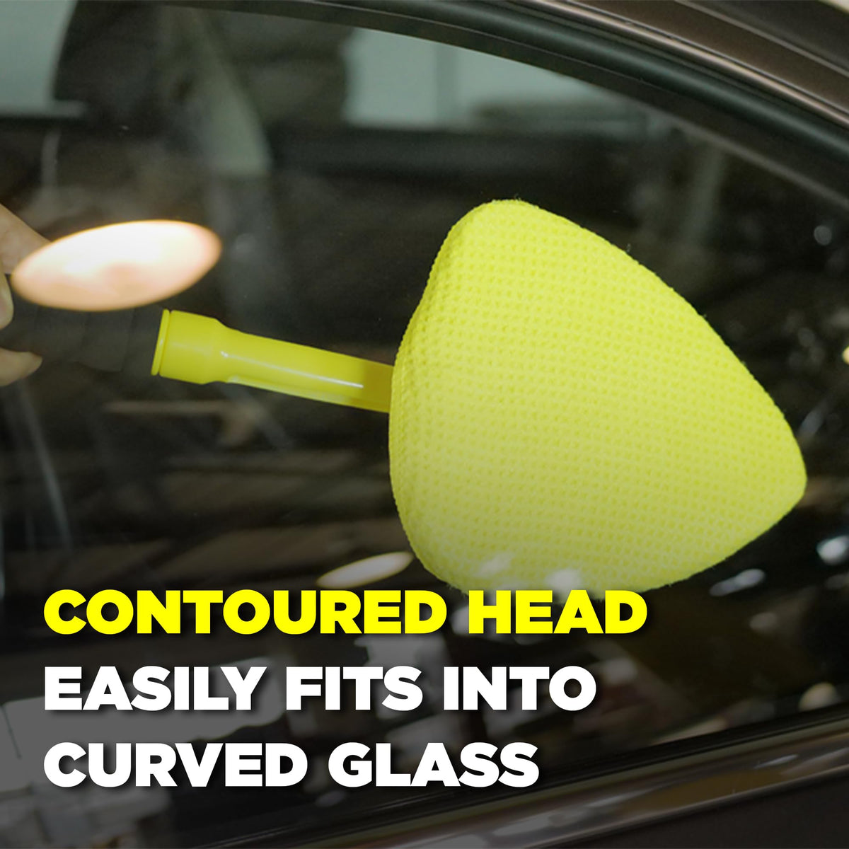 Invisible Glass tool in use on windshield demonstrating streak-free cleaning