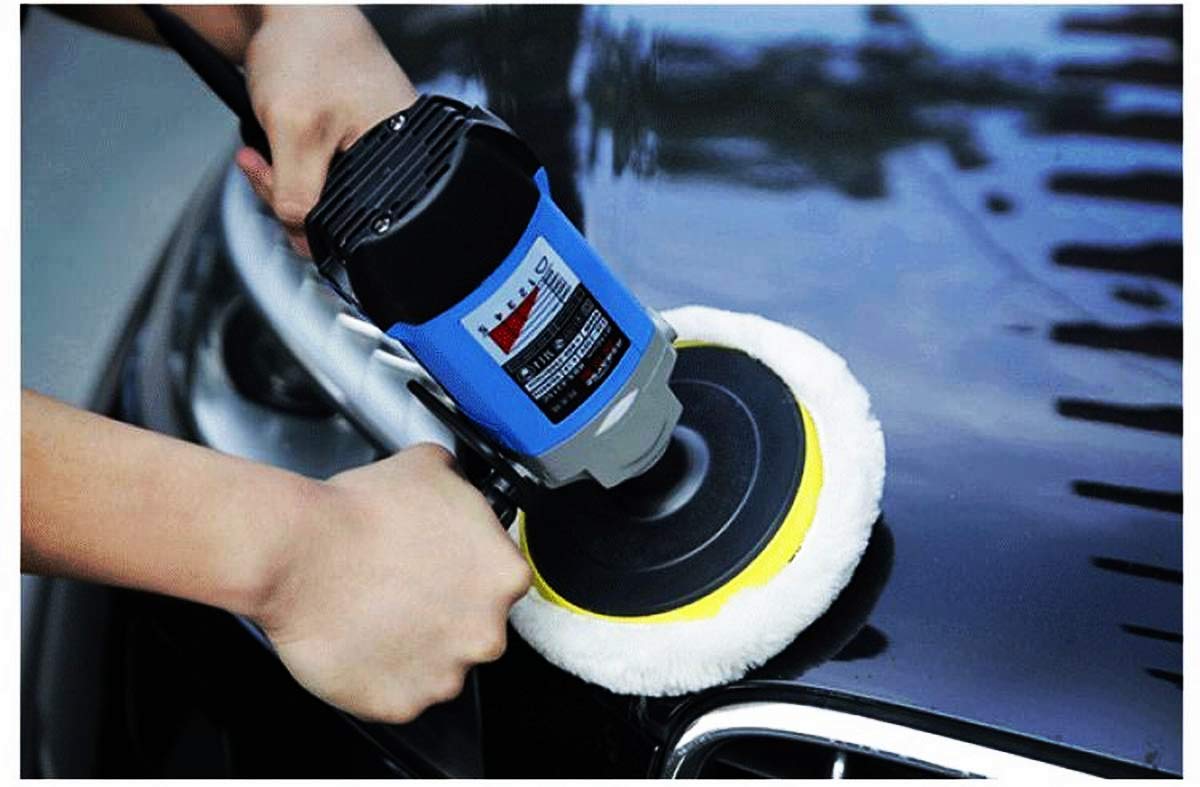 INZOEY pad polishing a car door demonstrating effective compound removal benefit