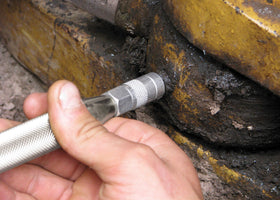 IPA Tools accessing recessed fittings under hood illustrating reach and convenience during vehicle service