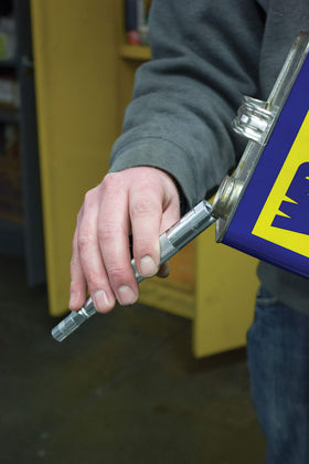 IPA Tools extra grease coupler on bench demonstrating adaptability to worn fittings for reliable seals