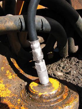 IPA Tools in use on truck wheel bearing to show effective clearing and replenishing of grease for longevity