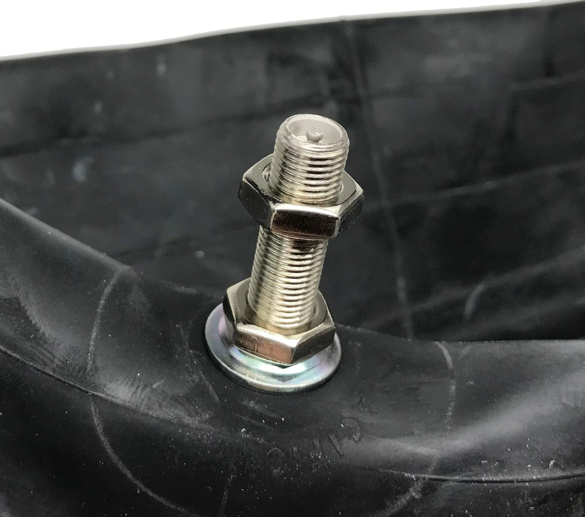 IRC tube TR4 valve stem closeup highlighting secure fit and leak-resistant design