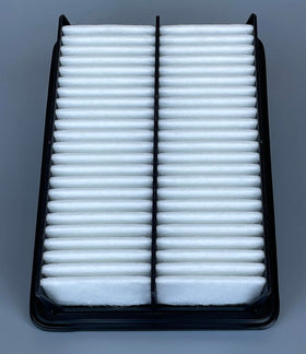 ITESIER cabin filter being inserted under dashboard, illustrating quick maintenance access