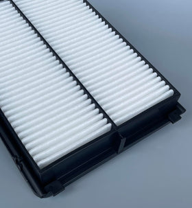 ITESIER filters beside ruler for size comparison ensuring OEM-compatible fit