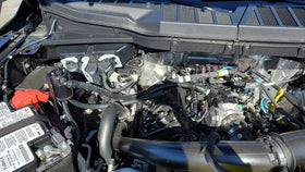 J&L Oil Separator installed in F-150 engine bay demonstrating OEM-style fitment