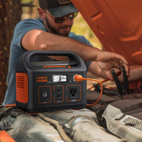 Jackery cable in use vehicle showing connection to car battery and on-the-go charging benefit