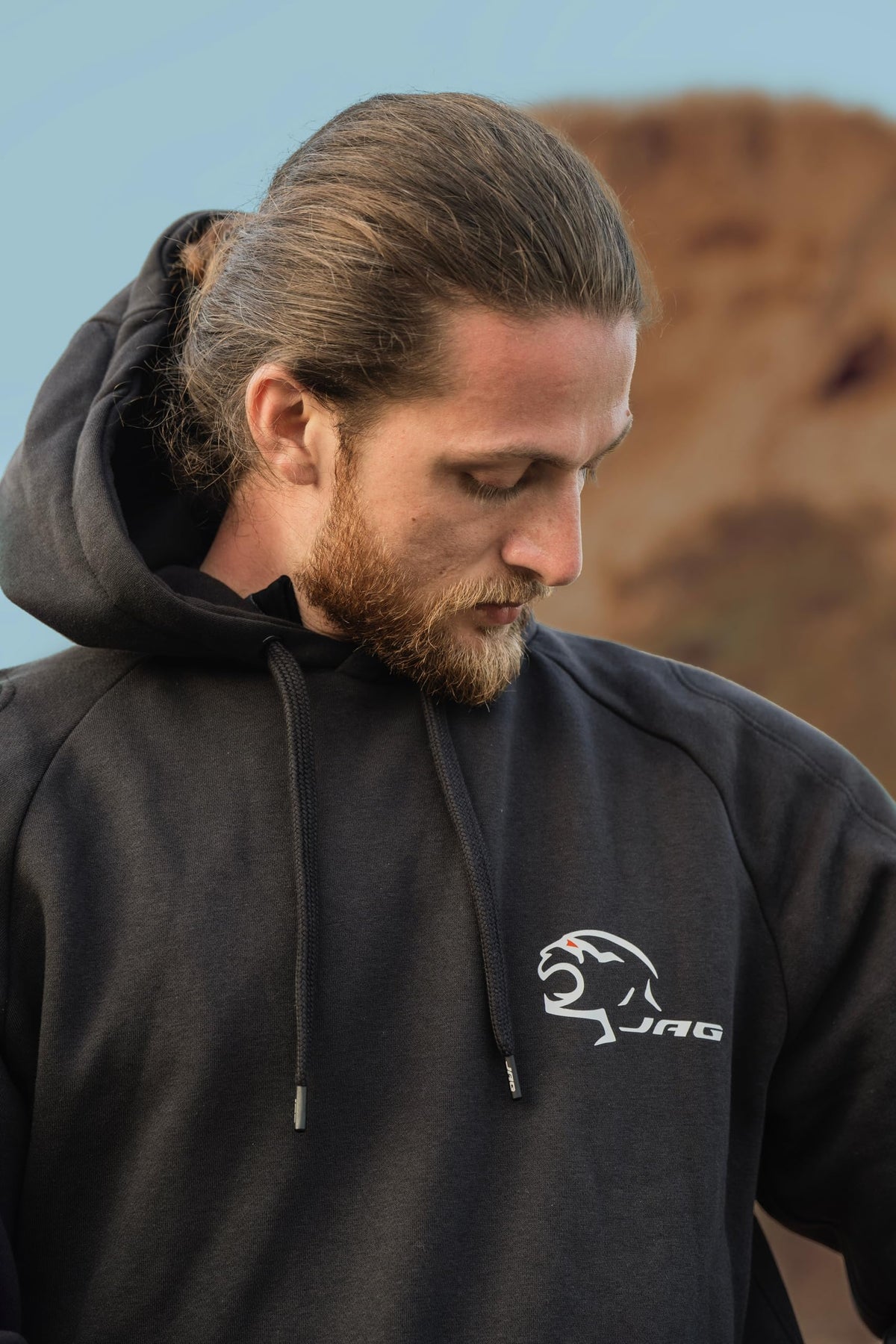 J.A.G. pullover hoodie front in grey, casual streetwear and riding-ready