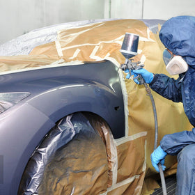 JANYUN filters on a workbench during automotive painting for cleaner finish