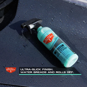 Jay Leno's Garage being wiped with microfiber for quick buff finish
