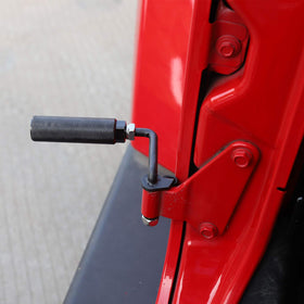 JeCar mounted on Jeep bottom door hinge showing easy installation benefit