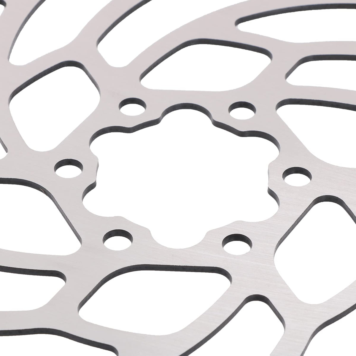 JFG RACING rotor edge close-up highlighting treated steel and durability