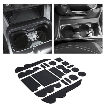 JKCOVER front packaging and full 19-piece kit protecting Tacoma interior