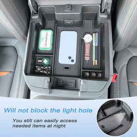 JKCOVER next to smartphone demonstrating tray capacity and scale