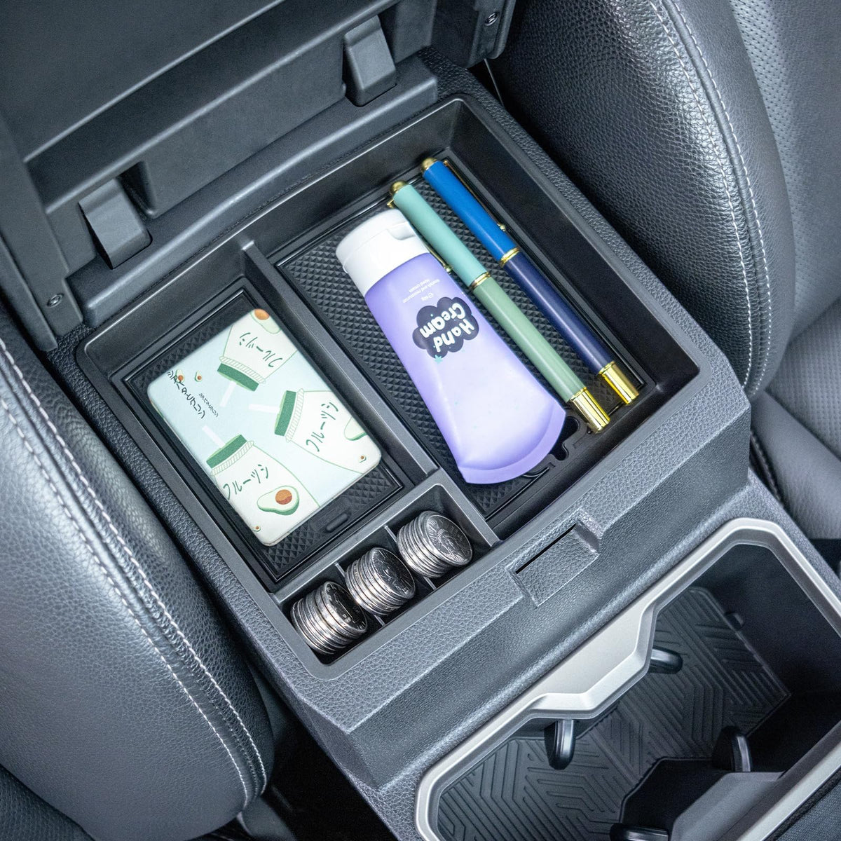 JKCOVER tray holding phone and sunglasses showing secure everyday item benefit