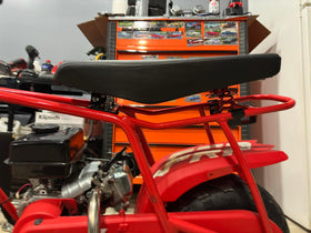 JMCHstore rider using sprung seat off-road showing reduced impact and smoother ride benefit