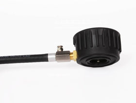 Joes Racing gauge attached to tire valve using flexible hose for convenient access