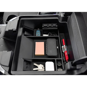 JOJOMARK tray installed in GMC Sierra console for tidy storage and access