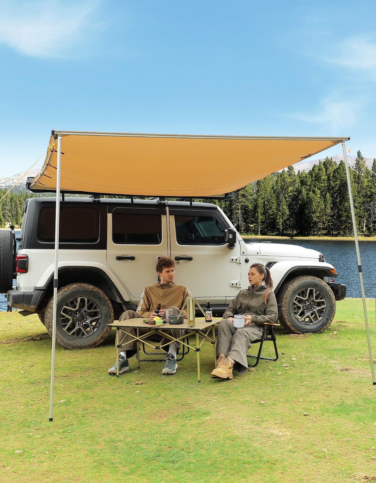 JOYTUTUS awning in use at campsite providing covered living space