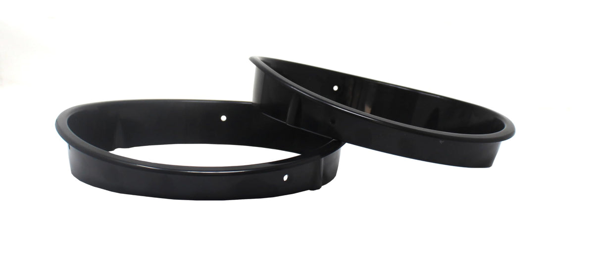 JSP Manufacturing bezels beside ruler for scale showing accurate OEM-style sizing