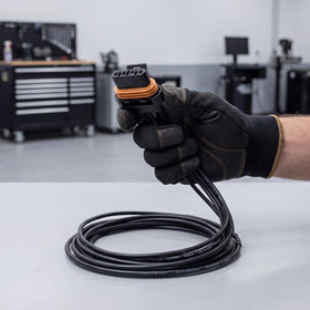 JUNRUO pigtail plugged into alternator demonstrating compatibility benefit
