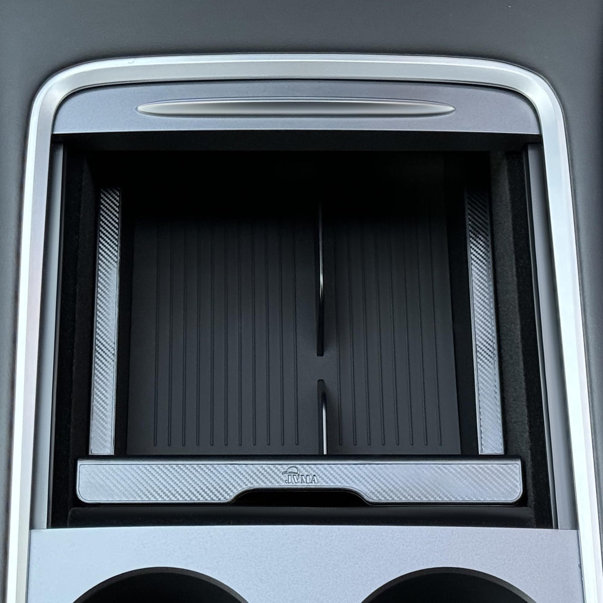 JVMA size comparison with smartphone illustrating compact organized capacity