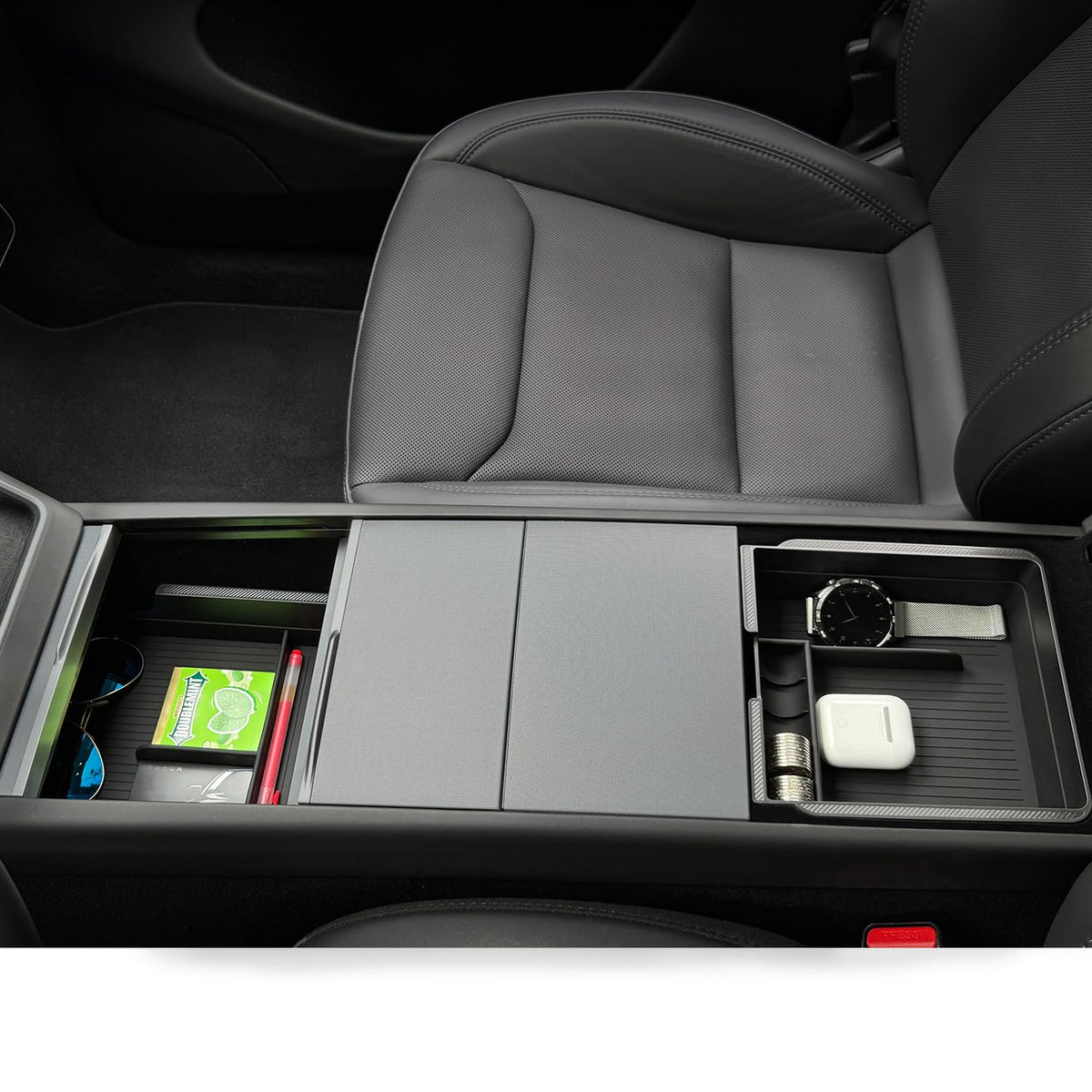JVMA lifestyle shot of driver accessing organizer for convenient on-the-go reach