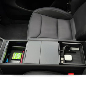 JVMA lifestyle shot of driver accessing organizer for convenient on-the-go reach