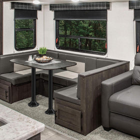 JYINCPED RV dinette setup illustrating sturdy, tidy table support
