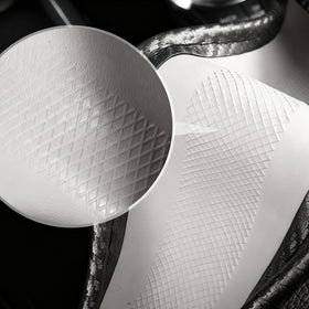 KAFEEK installation on steering wheel demonstrating easy stretch-on, tool-free setup