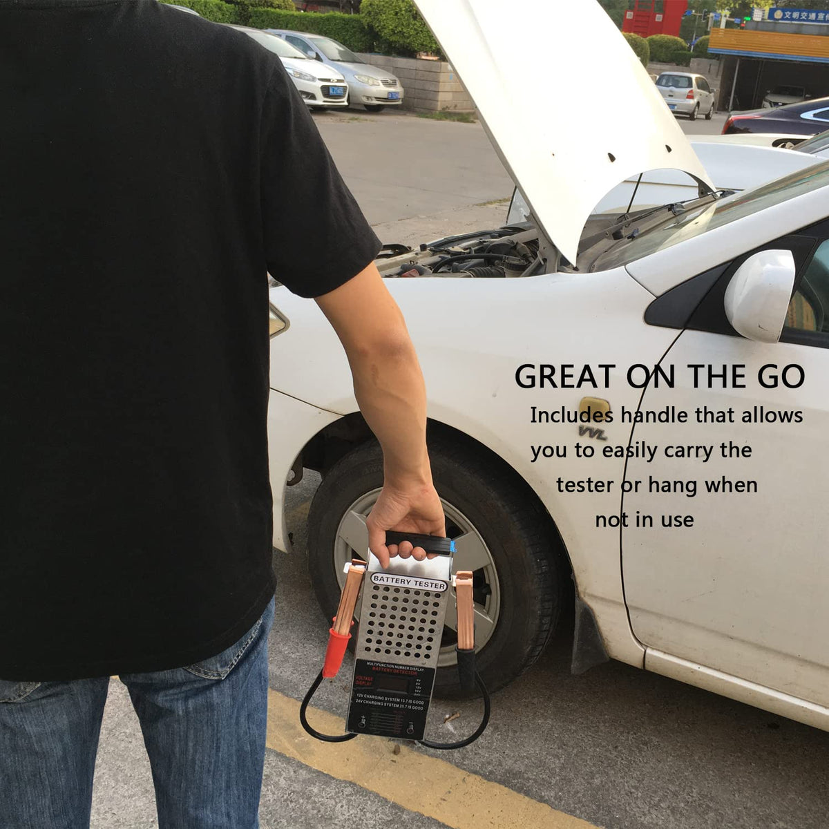 KAIHENG tester connected to a car battery demonstrating roadside use