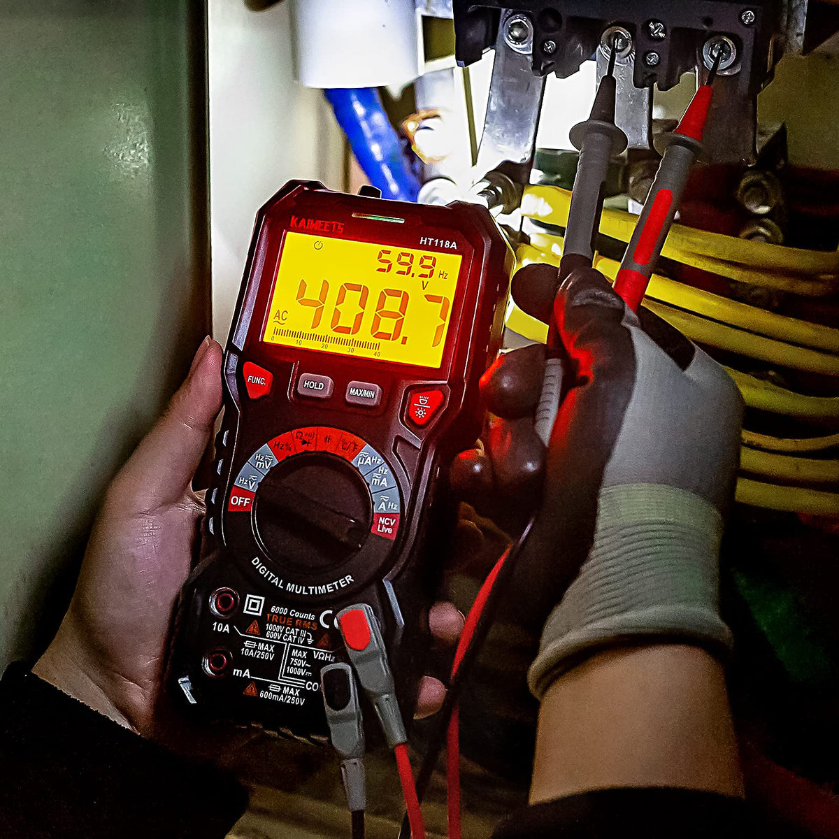 KAIWEETS HT118A held in hand to show compact size and ergonomic grip for field use